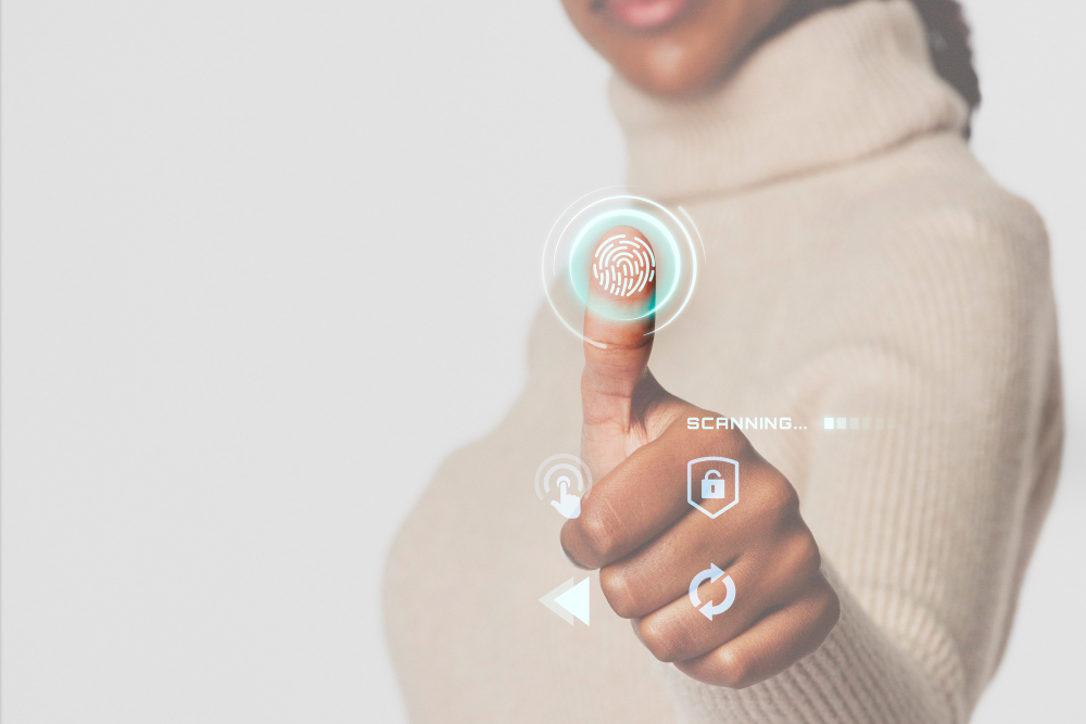 A Woman Using Fingerprint Method to Verify Her Identity
