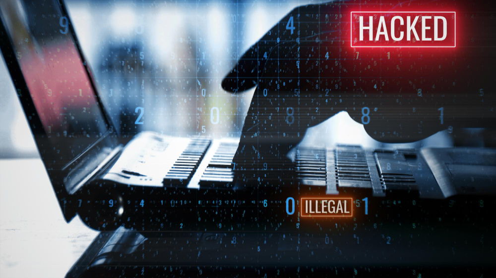 Two hands typing in a keyboard and trying to protect their system from DDoS attacks