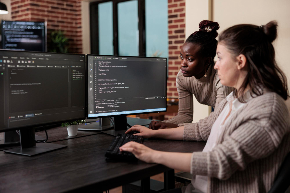 Two women learning how AES encryption works
