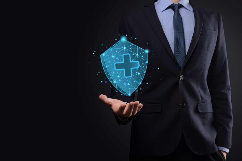 A man holding a logo symbolize cyber insurance