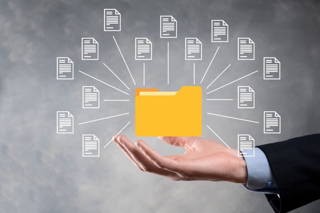 A hand holding directories concept