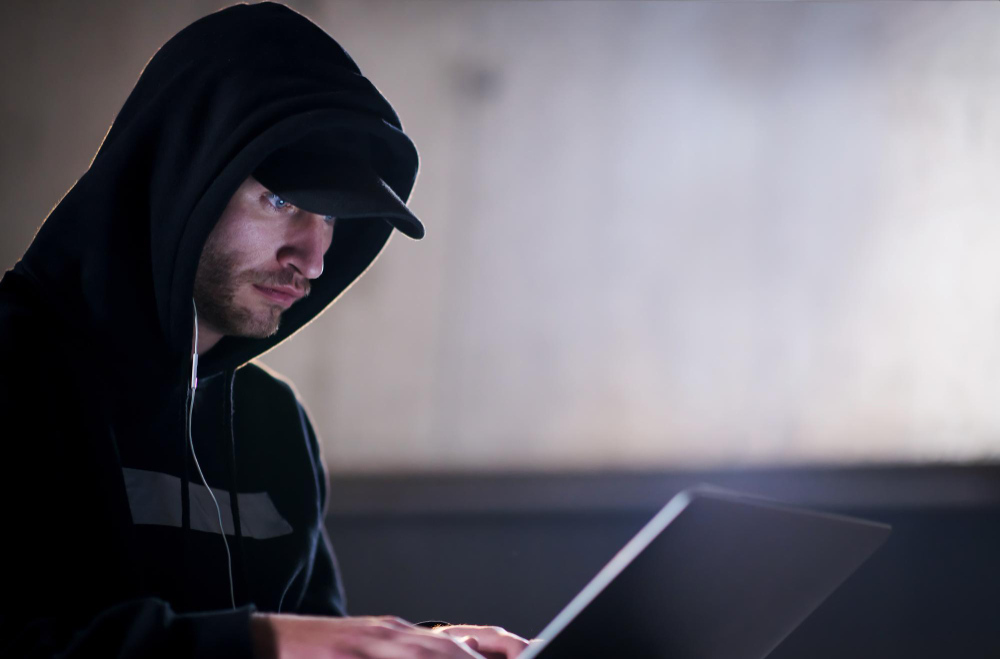 A hacker working on profiling his potential victim