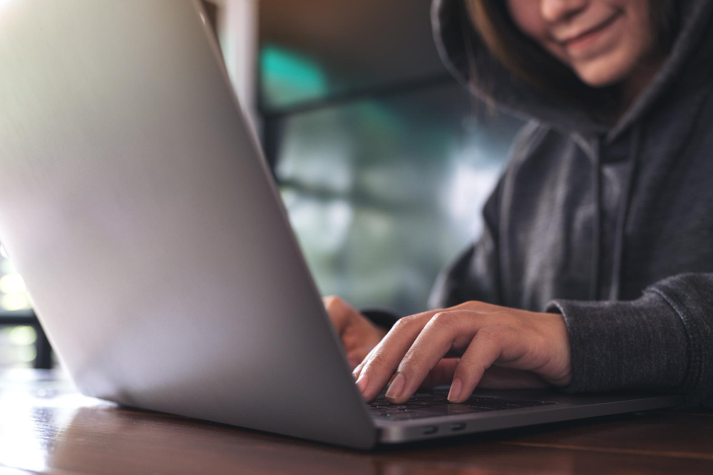 A person logging into their account using public WiFi