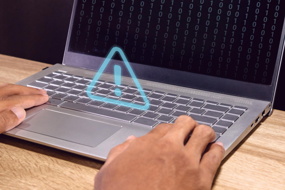A warning sign on a laptop